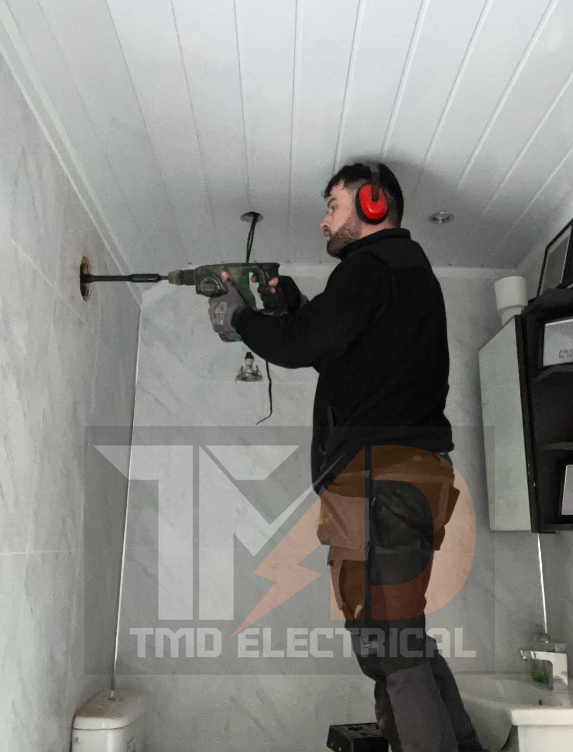 TMD electrician carrying out installation work