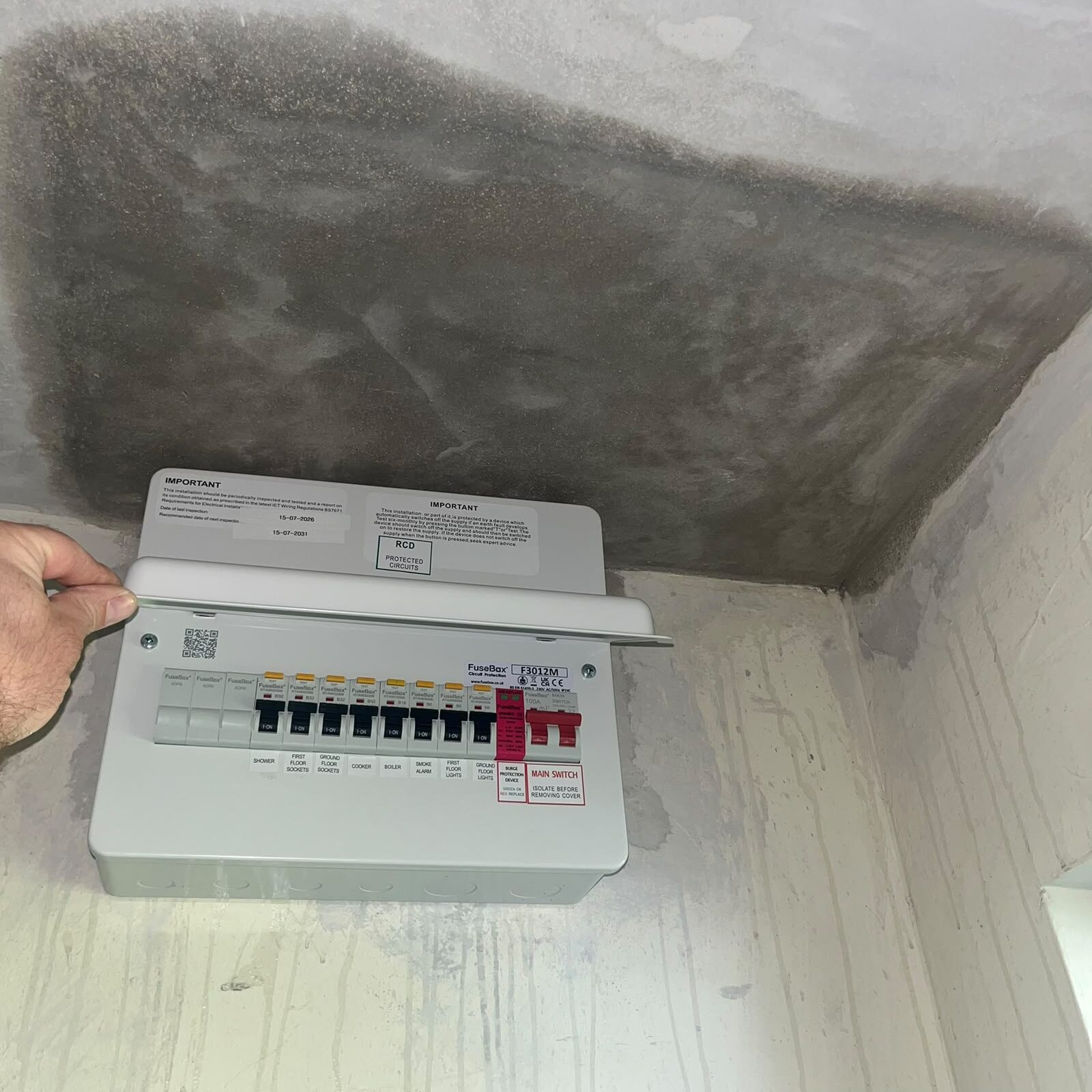 Fuse board cover fitted after a consumer unit upgrade